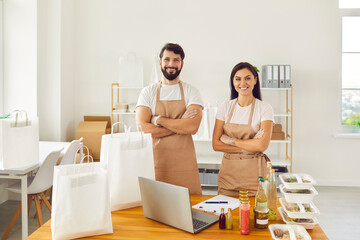 Workers in healthy food delivery service packing online orders concept