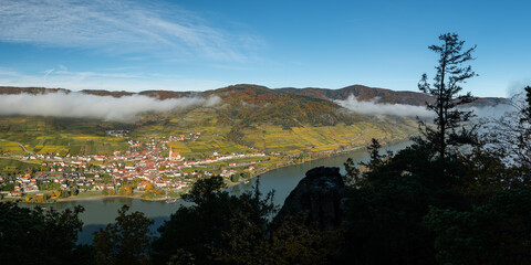 Wall Mural - Weissenkirchen Wachau Austria in autumn colored leaves and vineyards