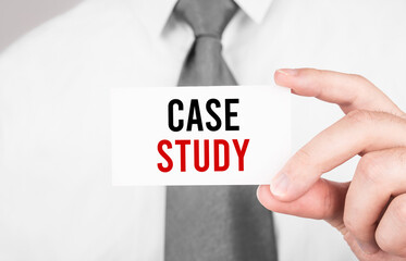 Aufkleber - Businessman holding a card with text CASE STUDY ,business concept