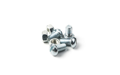 Nuts and screws with a threaded connection on a white background. Side view.