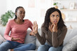 © Prostock-studio - Two african american women fighting at home