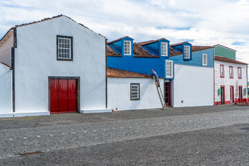 Wall Mural - Azores, Island of Pico. Typical Azorean houses in the port of Lajes.