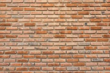 Wall Mural - brick walls background and texture. The texture of the brick is orange. Background of empty brick basement wall.