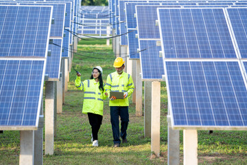 Poster - Engineer and Technician checking equipment in solar panels for great efficiency.