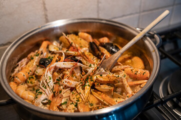 Wall Mural - fresh fish soup with scampi and seafood