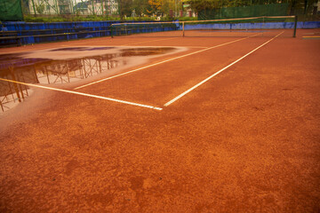 Poster - Outdoor tennis court on a rainy day