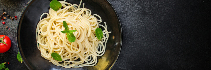 spaghetti pasta second course vegetable tomato eat gluten free dish top view copy space for text food background rustic