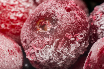 Ripe juicy frozen cherries closeup background texture