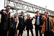 © AS Photo Family - Group of handsome retro well-dressed man gangsters smoking outdoor. Multiethnic male bachelor mafia party.