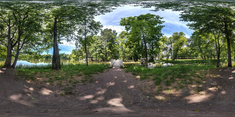 Wall Mural - full seamless spherical hdri panorama 360 degrees  angle view near wooden bridge over small river in forest in equirectangular projection, VR AR content.