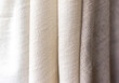 white and brown towel texture. Closeup natural cashmere scarf. brown texture background, close up of a fabric