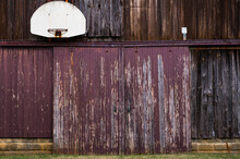 Basketball Net Hoop On Side Of Barn