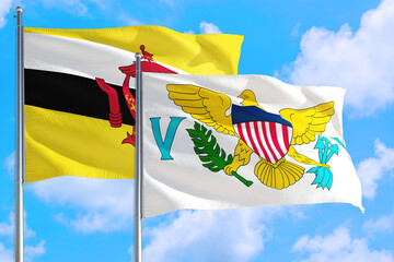 Wall Mural - United States Virgin Islands and Brunei national flag waving in the windy deep blue sky. Diplomacy and international relations concept.