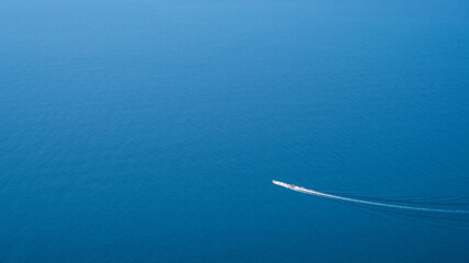 yacht sailing on a clear blue sea, boat in the sea