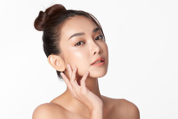 beautiful young asian woman with clean fresh skin on white background, face care, facial treatment, 