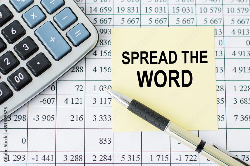 on a desk calculator, pen and note paper with text Spread the word on ...