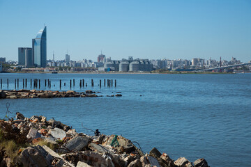 Wall Mural - Modern buildings and old destroyed part in port zone of Montevideo, La Plata Bay. Montevideo, Uruguay, Atlantic Ocean