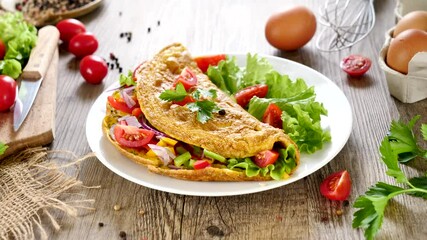 Wall Mural - omelet with vegetable and salad