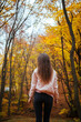 © Dimitar - Back view of a young female in the autumn park