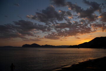 sea sunset on the background of rocks