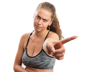 Woman with serious expression making no gesture in sportswear