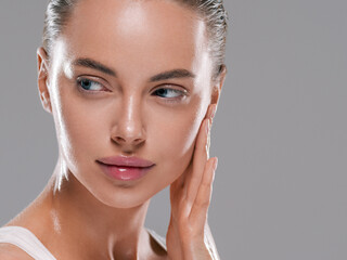 Wall Mural - beautiful woman face with healthy clean slon spa concept cosmetic skin care