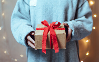 New year gifts, People holding gift at night, Close up.