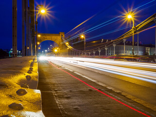 Wall Mural - Night time traffic in a city. Urban life, Public transportation