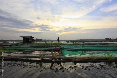 Cuadros en Lienzo Lake view in the afternoon with a stretch of ponds that are used for fisheries b