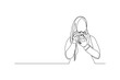 © MuhammadZulfan - Continuous line drawing of professional woman muslim hijab photographer take picture use camera. One line art concept of photography. Vector illustration