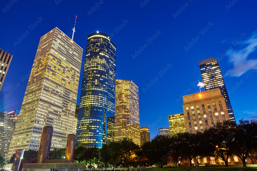Skyscrapers around Houston's Central Business District in Houston illuminated at dusk Stock ...