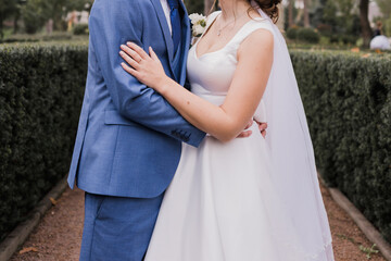 groom with bride together autumn park at wedding