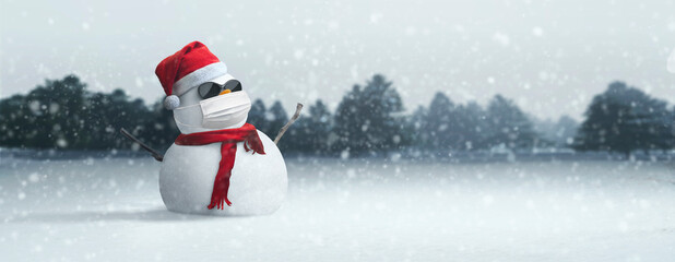 concept: snowman sunglasses, santa hat and mask during coronavirus pandemic on sunny christmas after