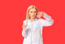Woman With Problem Of Excessive Thirst On Color Background. Diabetes Symptoms