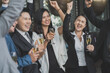 © NVB Stocker - Group Of Asian Friends Enjoying Evening Drinks in bar. Celebration, Party People Christmas and Happy new year concept. Asian business people in party.