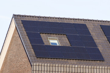 Solar panels on a brown roof for electric power generation