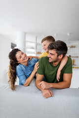 Wall Mural - Happy family having fun time at home