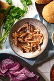 Fototapeta Mapy - Pulled pork with barbecue sauce and pickles