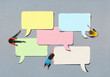 © fStop - Kids arranging blank multicolor speech bubbles