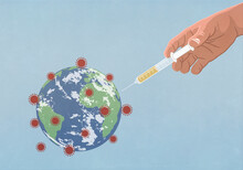Hand Injecting Coronavirus Globe With Vaccination Syringe
