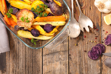 Poster - roasted colorful vegetable on wood background