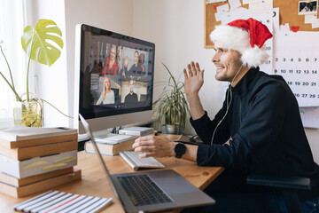 Video conference party online meeting with friends and family. Christmas party in facetime call. Parties during coronavirus quarantine Long Distance Celebration. Video conferencing happy hour