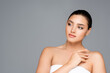 © LIGHTFIELD STUDIOS - beautiful woman posing isolated on grey