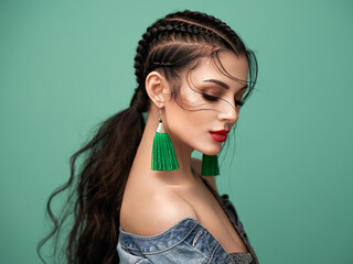 brunette girl with perfect makeup. beautiful model woman with curly hairstyle. care and beauty hair 