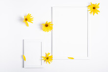 White Empty Picture Frame Mock Up With Yellow Flower On White Background, Flat Lay
