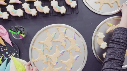 Sticker - Flat lay. Step by step. Decorating unicorn sugar cookies with royal icing.