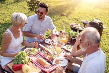 Wall Mural - Family having a barbecue party