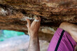 © Cavan Images - A climber's fingers caught in the rock.