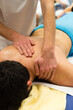 © Albert - A masseur performs a back massage on a patient