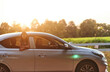 © Cavan Images - Woman and her children during the road trips